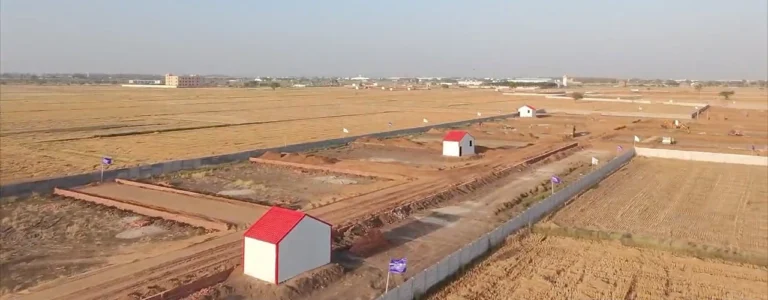 Aerial view of land parcels, internal tracks and boundary walls at Greenwood Enclave Township.
